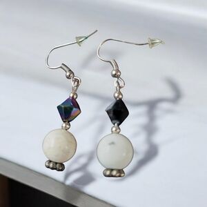 Pair of white and Aurora Borealis earrings